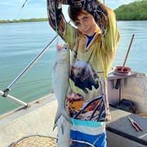 A young angler with his catch